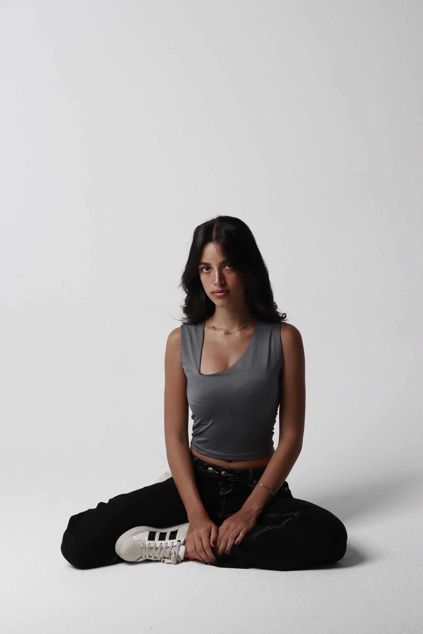 Asymmetric neck top