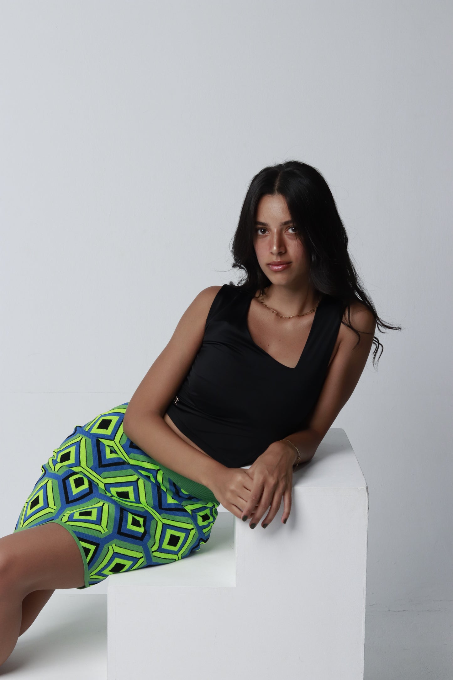 Asymmetric neck top