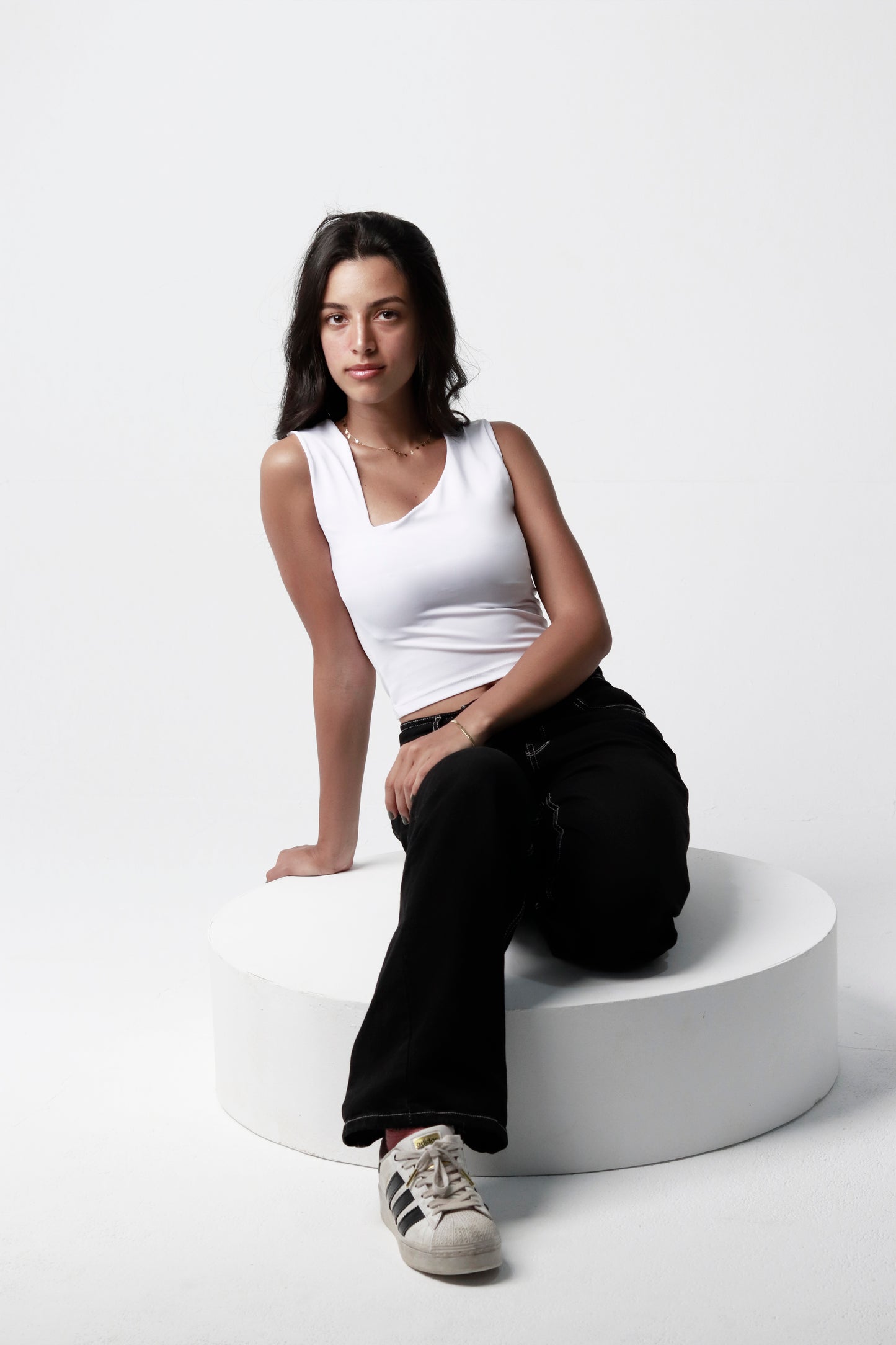 Asymmetric neck top